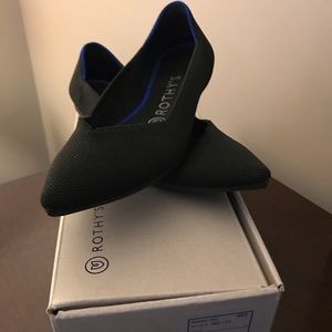 Rothy’s pointed flats in solid black. Size 7